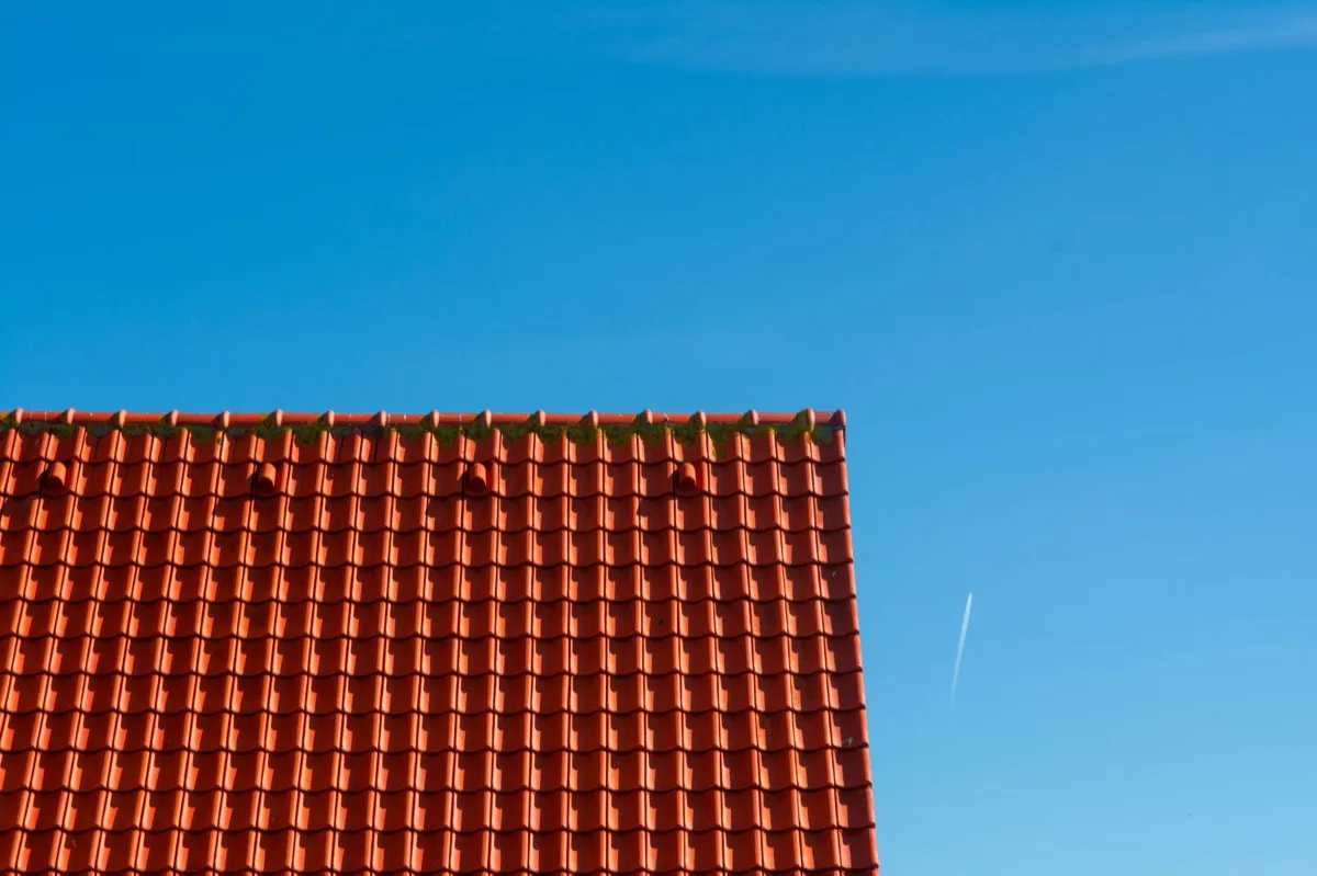 Tile roof gable in full sun, the kind of exposure that sets roof life in Green Bay, WI